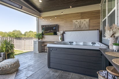Home hot tub with jets and a cover opened up