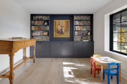 Reading room with a small table for children against the window