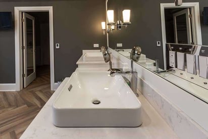 Double vanity bathroom sink with raised porcelain sink basins