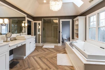 Luxurious and contemporary bathroom with a walk-in shower and built-in jet tub