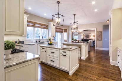 Kitchen remodel with hard wood flooring and lots of natural light pouring in