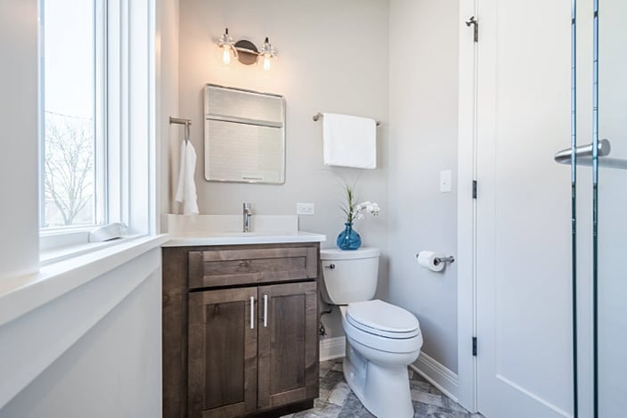 Small HDC bathroom with brown wooden cabinets