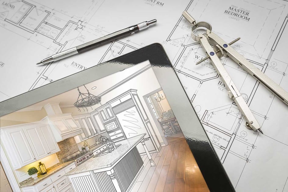 Architectural floor plan for a new home remodeling project with sketches, a pencil, and a compass